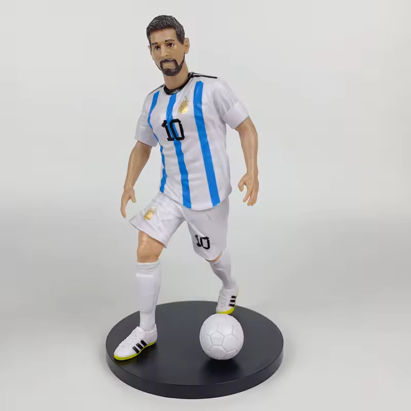 Football star figurines featuring Ronaldo, Mbappé and Messi