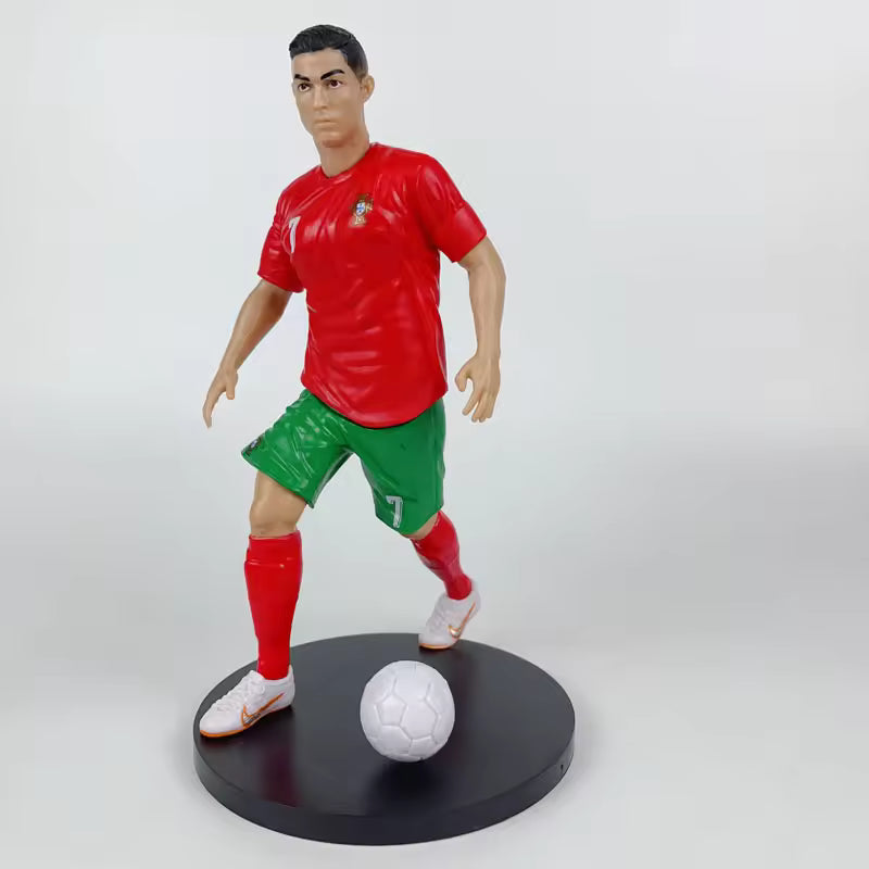 Football star figurines featuring Ronaldo, Mbappé and Messi