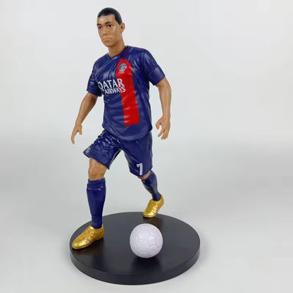 Football star figurines featuring Ronaldo, Mbappé and Messi