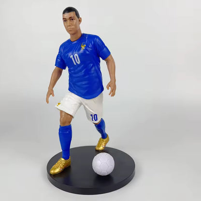 Football star figurines featuring Ronaldo, Mbappé and Messi
