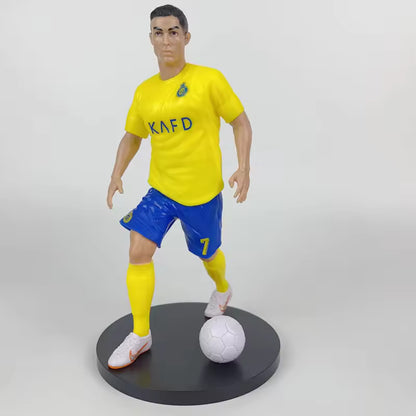 Football star figurines featuring Ronaldo, Mbappé and Messi