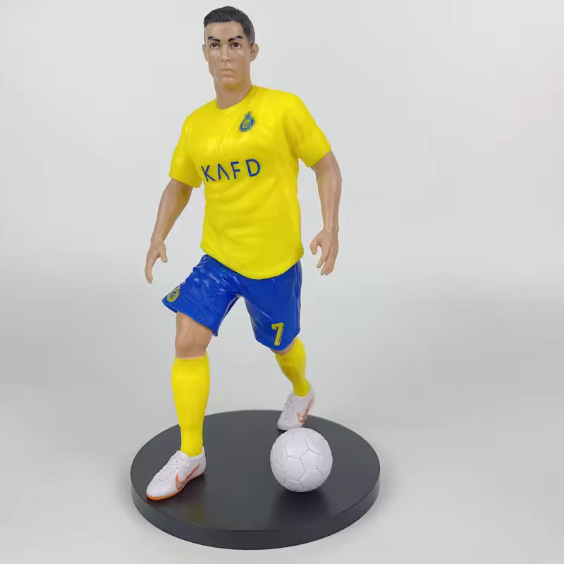 Football star figurines featuring Ronaldo, Mbappé and Messi