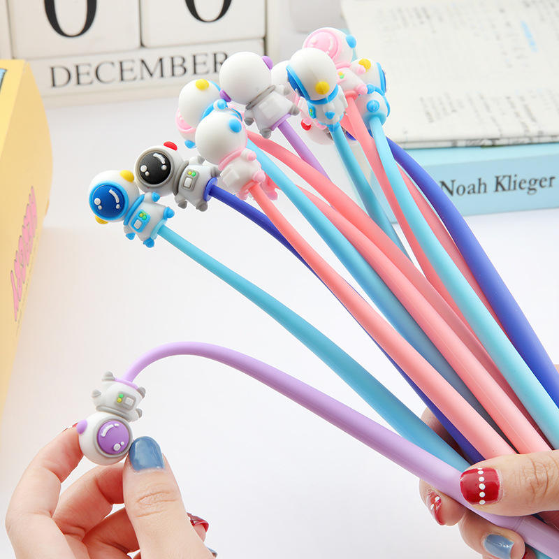 Space themed gel pens with astronaut toppers